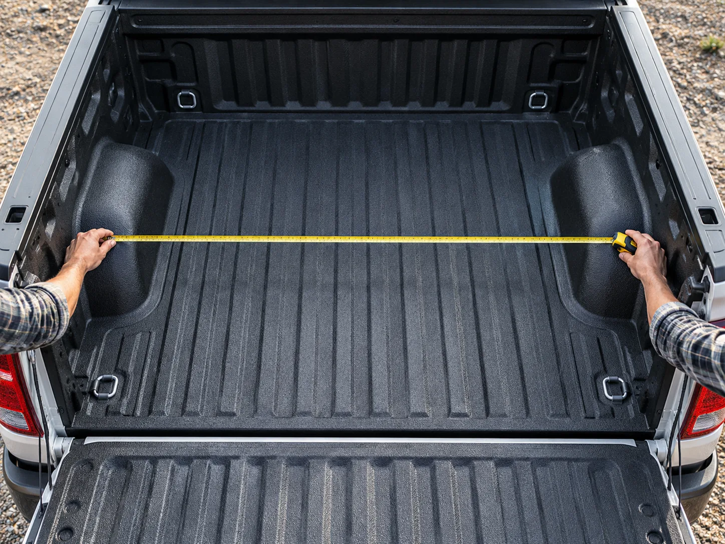 Illustrative measurement of pickup bed width around wheel wells